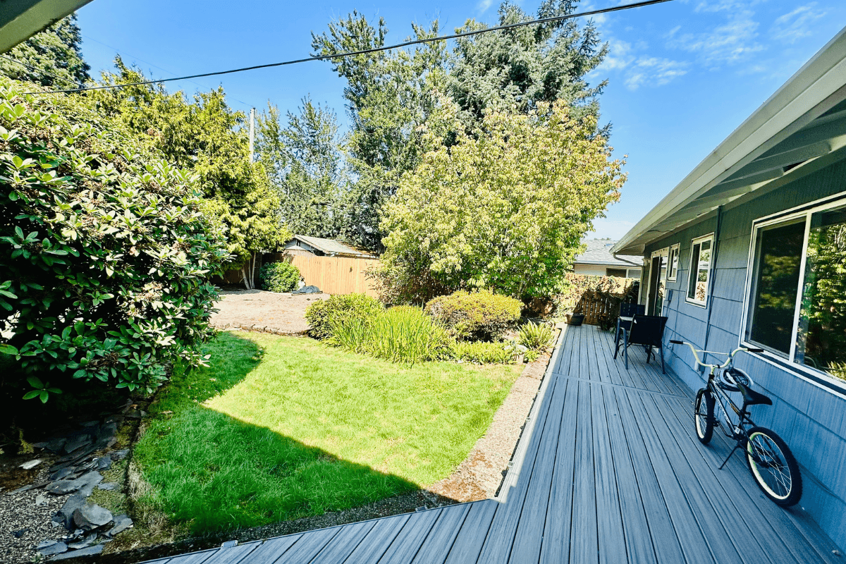 Peaceful outdoor garden and deck area for relaxation, fresh air, and activities.